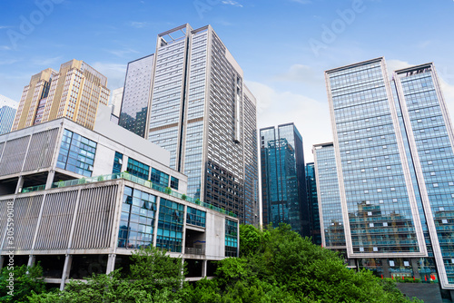 Lawn and dense modern buildings, Chongqing, China.
