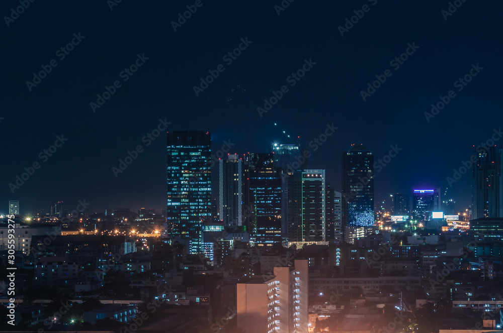 Bangkok night view with skyscraper in business district in Bangkok Thailand