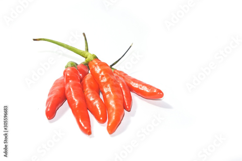 Closeup orange red chili pepper on white background. Close-up chilli pepper with clipping path isolated on white background