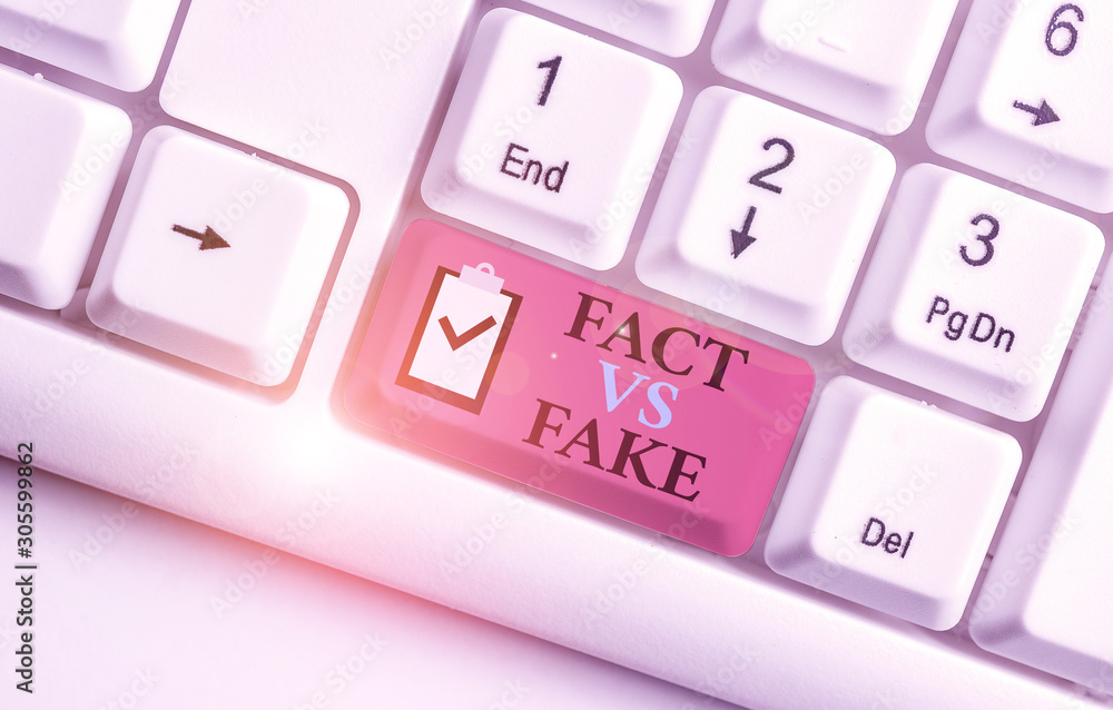 Writing note showing Fact Vs Fake. Business concept for Rivalry or