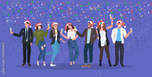 businesspeople in santa hats having confetti corporate party mix race business people celebrating merry christmas happy new year winter holidays concept horizontal full length vector illustration