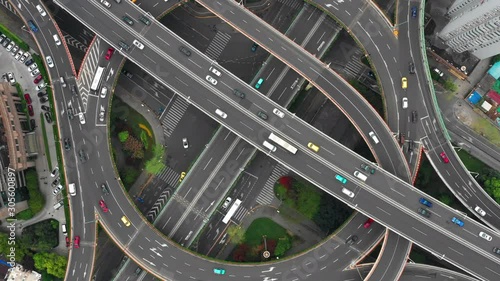 Aerial Video of car traffic and huge elevated road circle multilevel complex, car transportation scene in Shanghai, China in 4K UHD