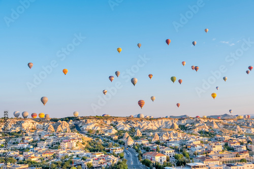 Balloon hot air over Göreme against blue sky, Cappadocia, Turkey