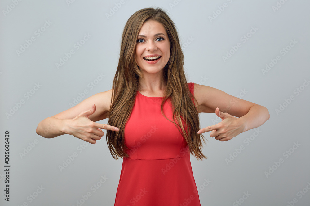 Happy young woman pointing on her breast. Stock Photo