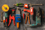 Construction worker tools on a dark background top view. Remodel concept