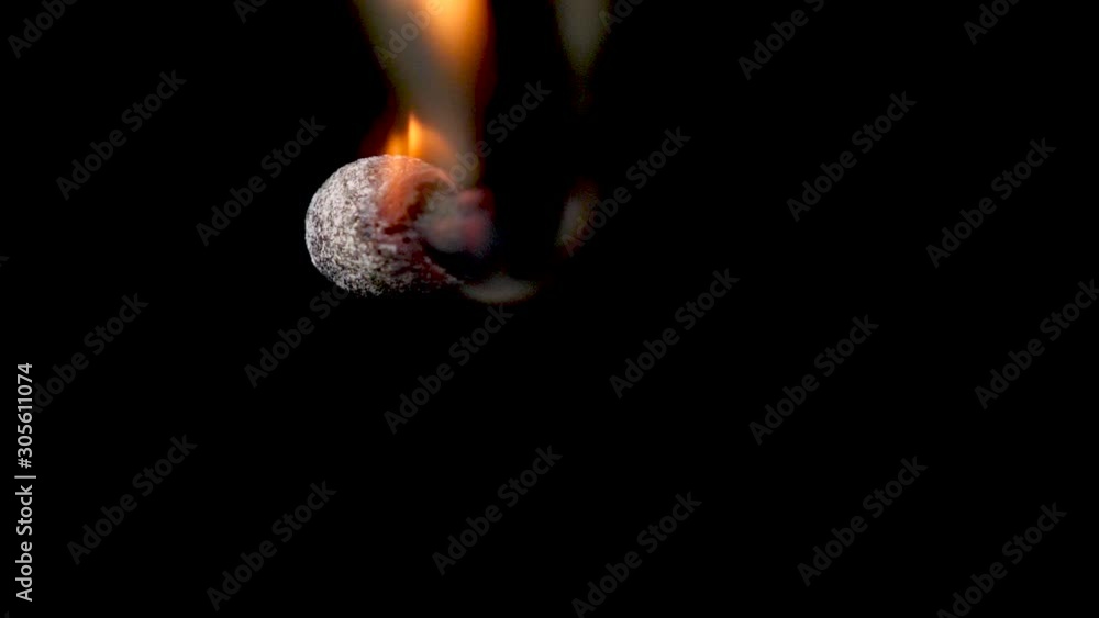 Macro of matchstick burning. Clip is then reversed to make matchstick new again. 