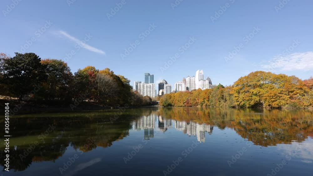 Serene view of the Atlanta skyline from Piedmont Park's Reflection Lake. Serene view of the Atlanta skyline from Piedmont Park's Reflection Lake.