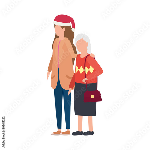cute grandmother with daughter using christmas hat