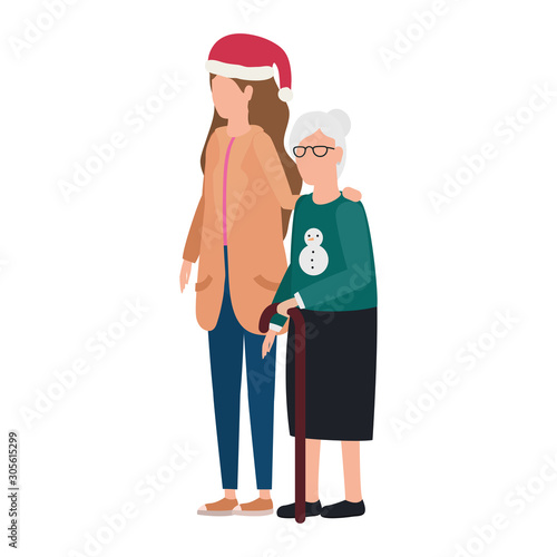 cute grandmother with daughter using christmas hat