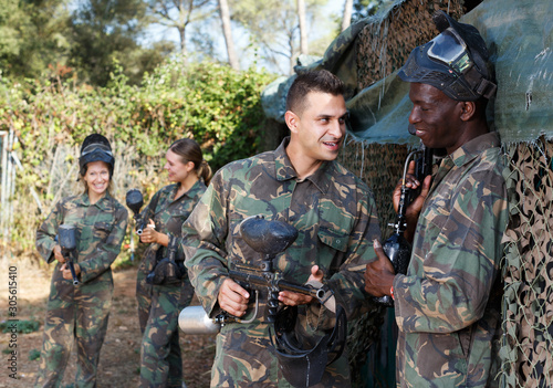 paintball players getting ready for match