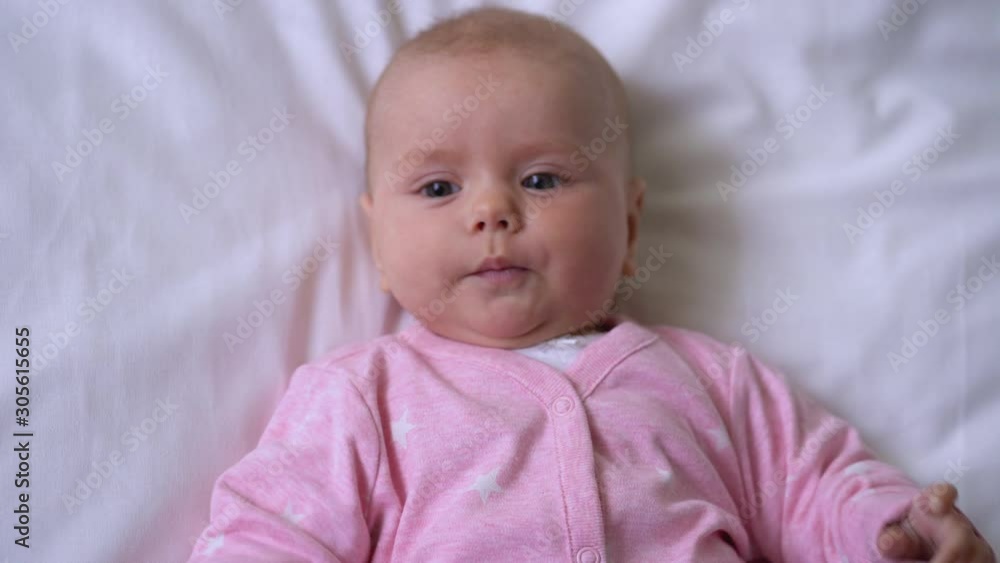 Sleepy baby rubbing eyes before nap tired after active playtime, bedtime routine Sleepy baby rubbing eyes before nap tired after active playtime, bedtime routine
