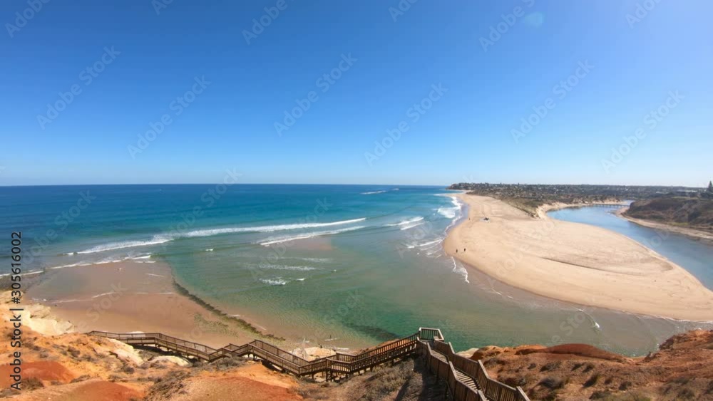 Australian beach and coastline drone aerial footage of the spectacular South Australian Southport Onkaparinga River mouth estuary.