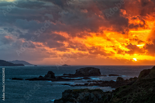 Dramatic Sky of Fire over Miranda Islands at the Mouth of Ares Estuary La Coruna Galicia