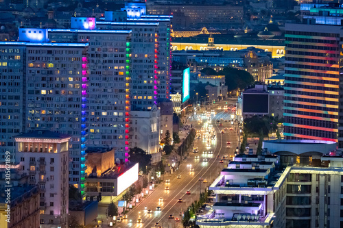 Moscow. Russia. The road in Moscow at night. Highways of Russia. Cars are driving in Moscow. A trip to the capital of Russia. Lights of the night city. Streets. City landscape view from a drone.