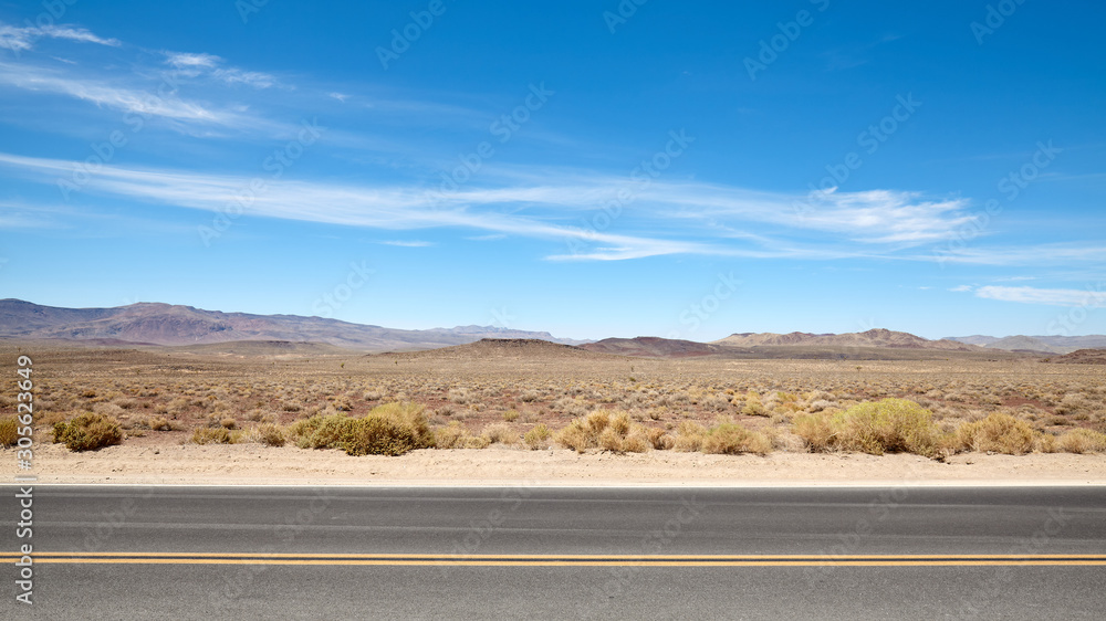 Desert road landscape in Death Valley, US.