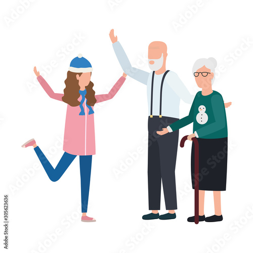 grand parents with granddaugther using christmas hat