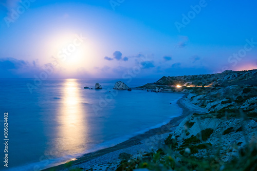 Cyprus. Rock Aphrodite. Dawn. Stone Petru tou Romiu. Sea cliffs on the beach. Landscape of the Cyprus coast. Excursions to the stone of Aphrodite. Sunrise. Guide to Cyprus. Mediterranean Sea. Sights photo