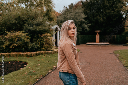 Portrait Charming Young Woman with Blonde Hair, Street Style © ChrisGhinda