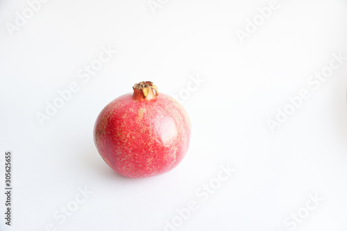Pomegranate fruit isolated on a white background.