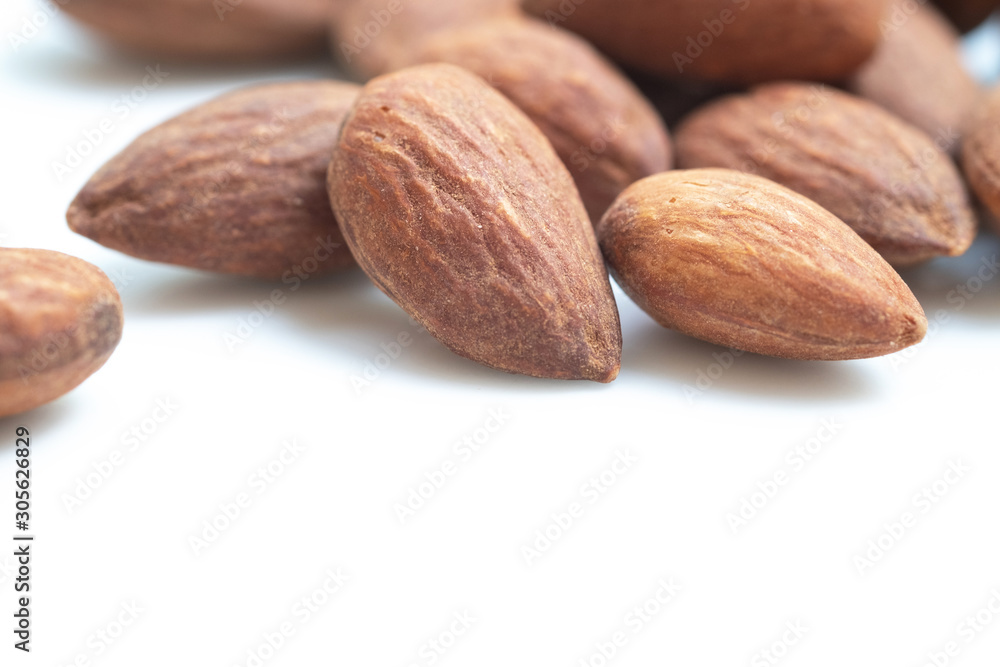 Flavored almonds on white background. Flavored almonds on white background.