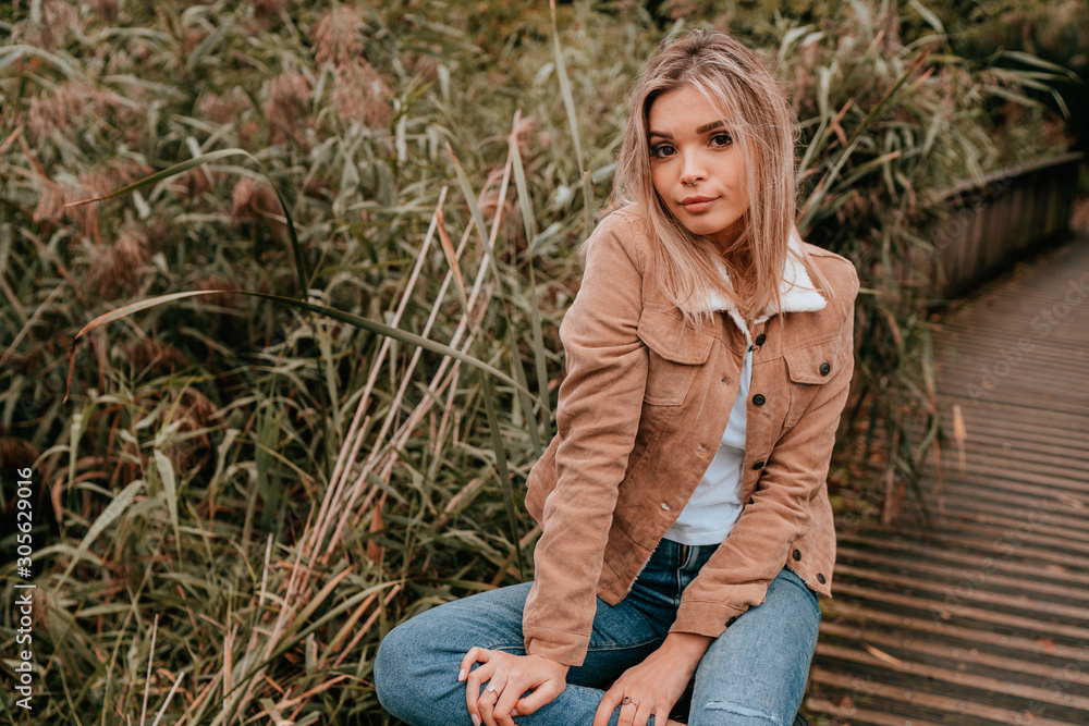 Portrait Charming Young Woman with Blonde Hair, Street Style Portrait Charming Young Woman with Blonde Hair, Street Style