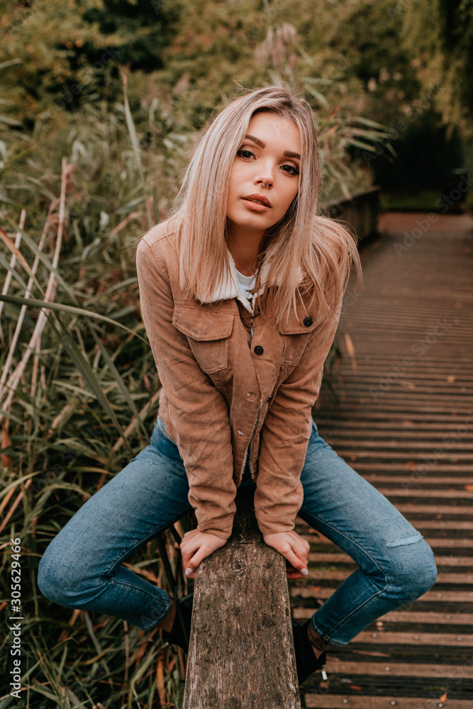 Portrait Charming Young Woman with Blonde Hair, Street Style Portrait Charming Young Woman with Blonde Hair, Street Style