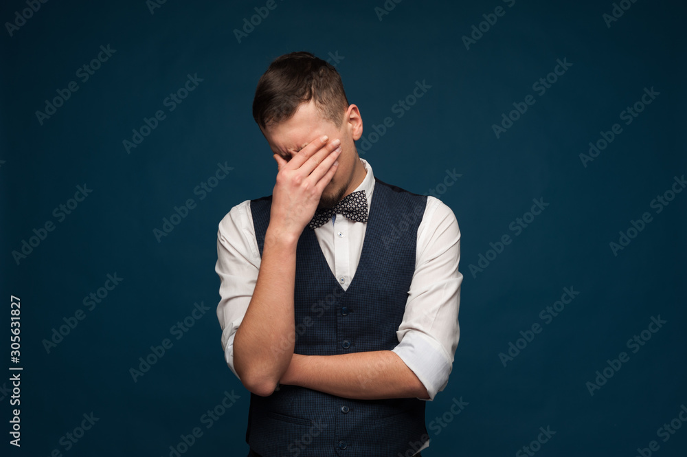 Disappointed unidentified man in formal clothes Disappointed unidentified man in formal clothes