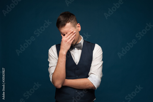 Disappointed unidentified man in formal clothes