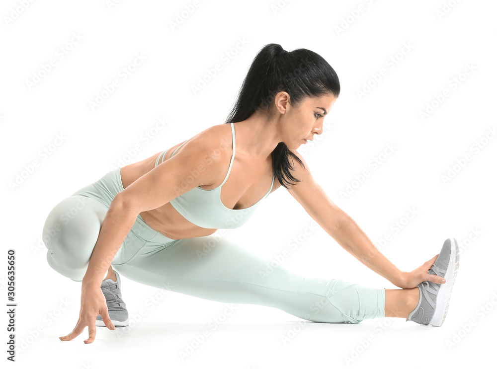 Sporty muscular woman isolated on white Sporty muscular woman isolated on white