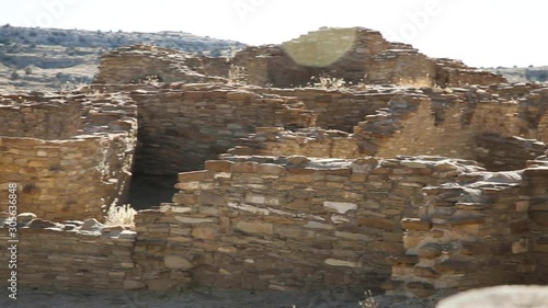Quick pan across ruin walls at Chetro Ketl in New Mexico. Close up of brick walls made thousands of years ago by the Anasazi people. This site was used for religious ceremonies and blends with terrain