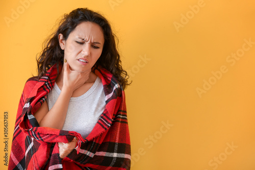 Woman ill with flu on color...