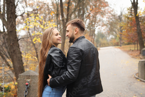 Loving young couple in autu...