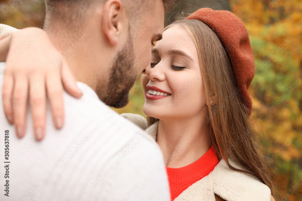 Loving young couple in autumn park Loving young couple in autumn park