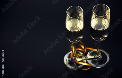 Champagne in the the glass New Year Christmas. New year concept 2020