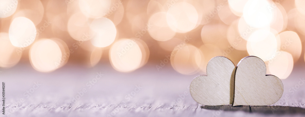 Fototapeta premium Two hearts on bokeh background
