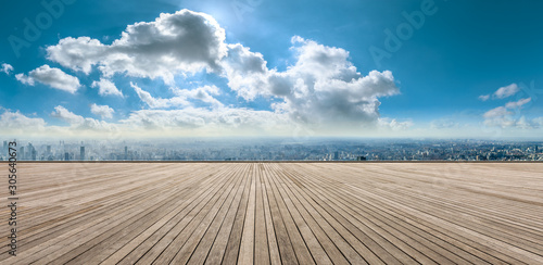 Photography Wooden square and city skyline with buildings in Shanghai,China.