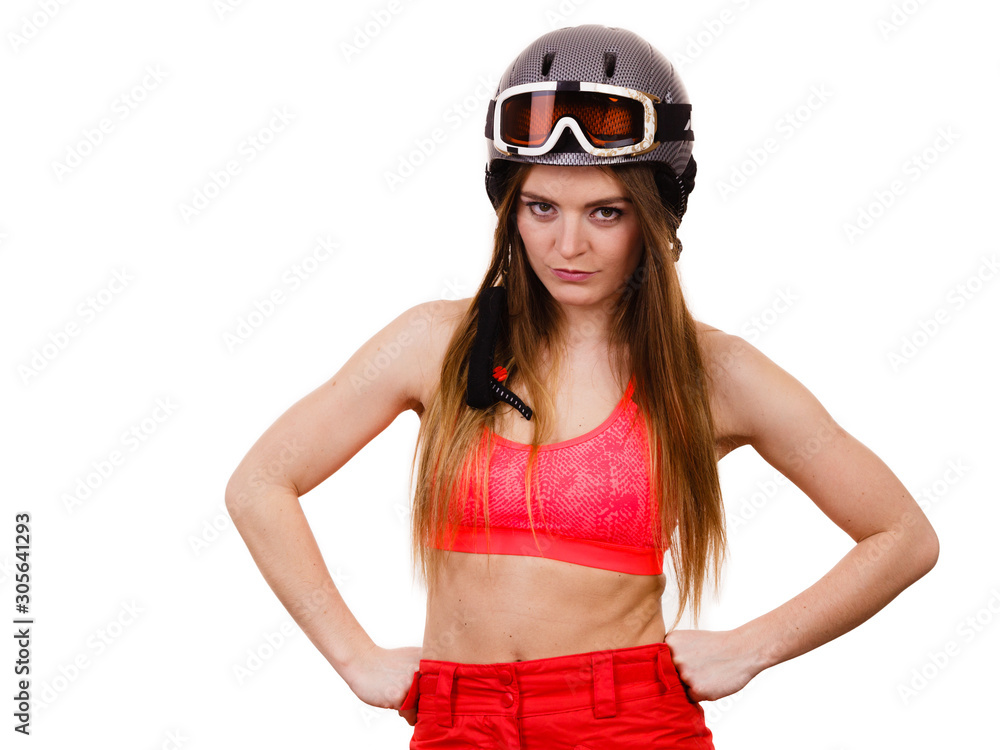Woman wearing ski suit and helmet with goggles Woman wearing ski suit and helmet with goggles