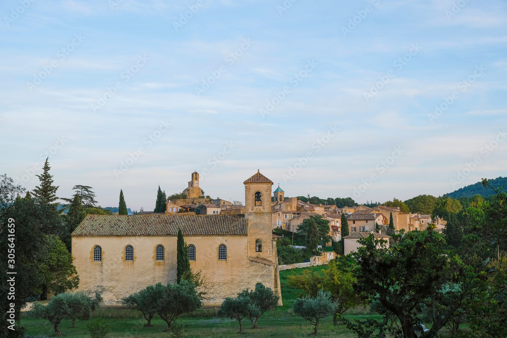 Editorial. Lourmarin. Provence. France. October 27. 2019. Village on the hill at golden hour. Sunset. Provence tourism.