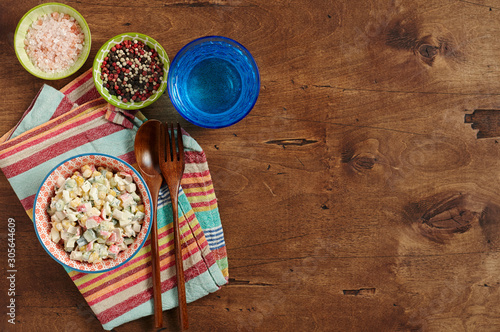 Obraz na płótnie Bowl of Surimi Seafood Salad with sweet corn, cucumbers, boiled eggs and mayonnaise w salonie