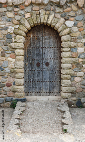 Old-fashioned entrance of the stone building