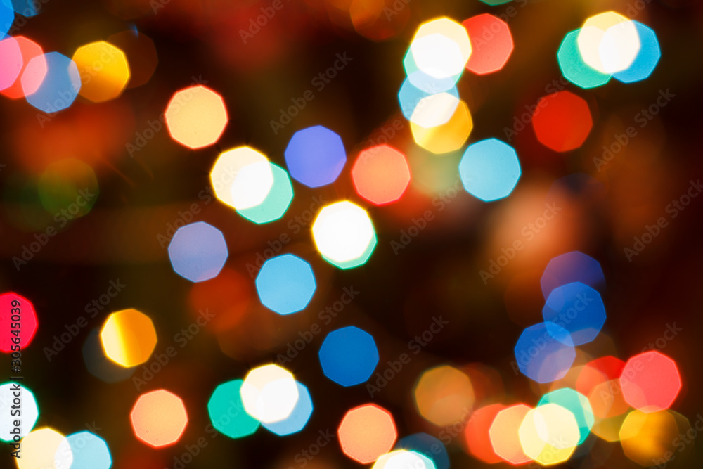 Christmas blurred background with colorful festive lights. Christmas blurred background with colorful festive lights.