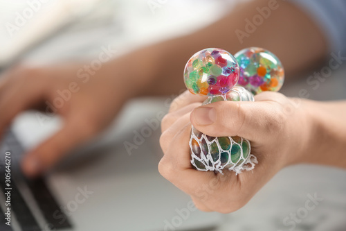 Wallpaper Mural Woman squeezing colorful slime, closeup. Antistress toy Torontodigital.ca