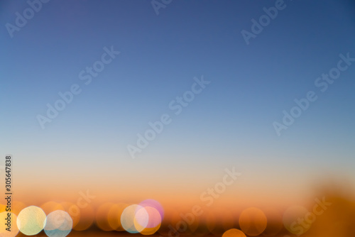 Gradient sky with city light bokeh effect at the bottom / gradient effect / background concept / sky texture © Nut