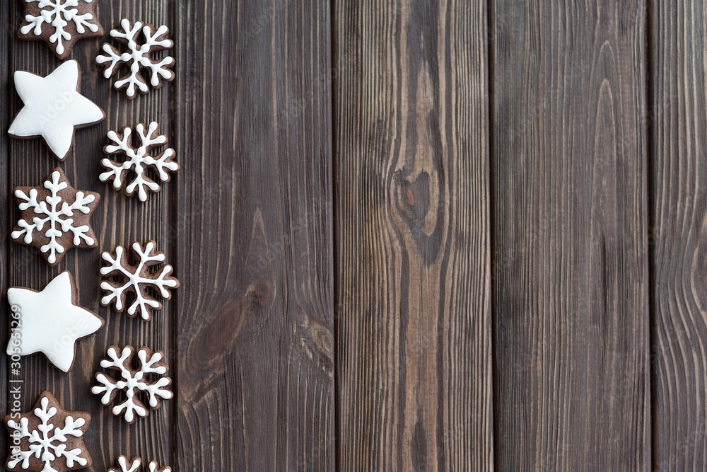 Gingerbread cookies snowflakes on wood table. copy space. Gingerbread cookies snowflakes on wood table. copy space.