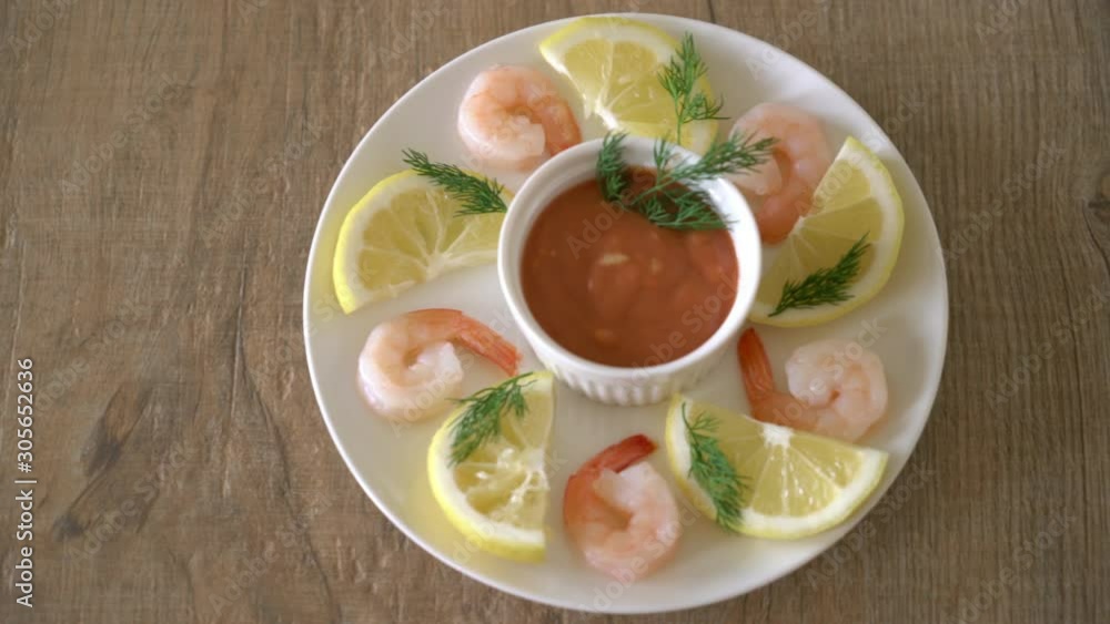 shrimp cocktail with sauce and lemon shrimp cocktail with sauce and lemon