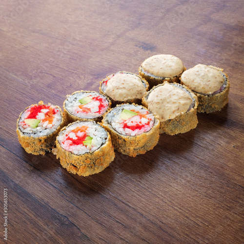 Japanese rolls for menu Photo on wooden table