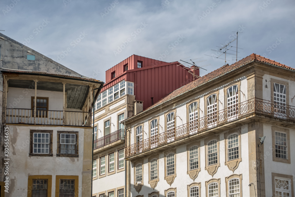 View at a classic traditional urban buildings on Viseu city Downtown, Portugal