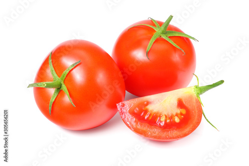 fresh tomatoes with slices isolated on white background