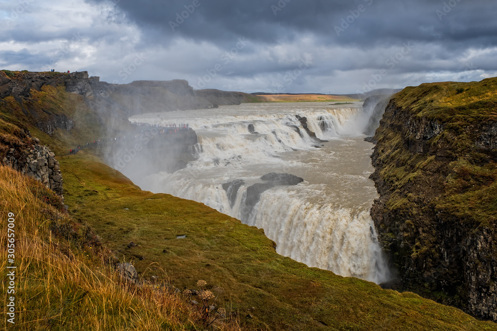 Amazing Gullfoss waterfall with rainbow in Iceland. September 2019