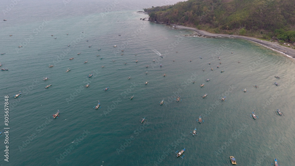 sailors looking for fish in the Indonesian sea sailors looking for fish in the Indonesian sea